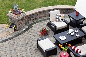 Brick paved patio with comfortable patio furniture